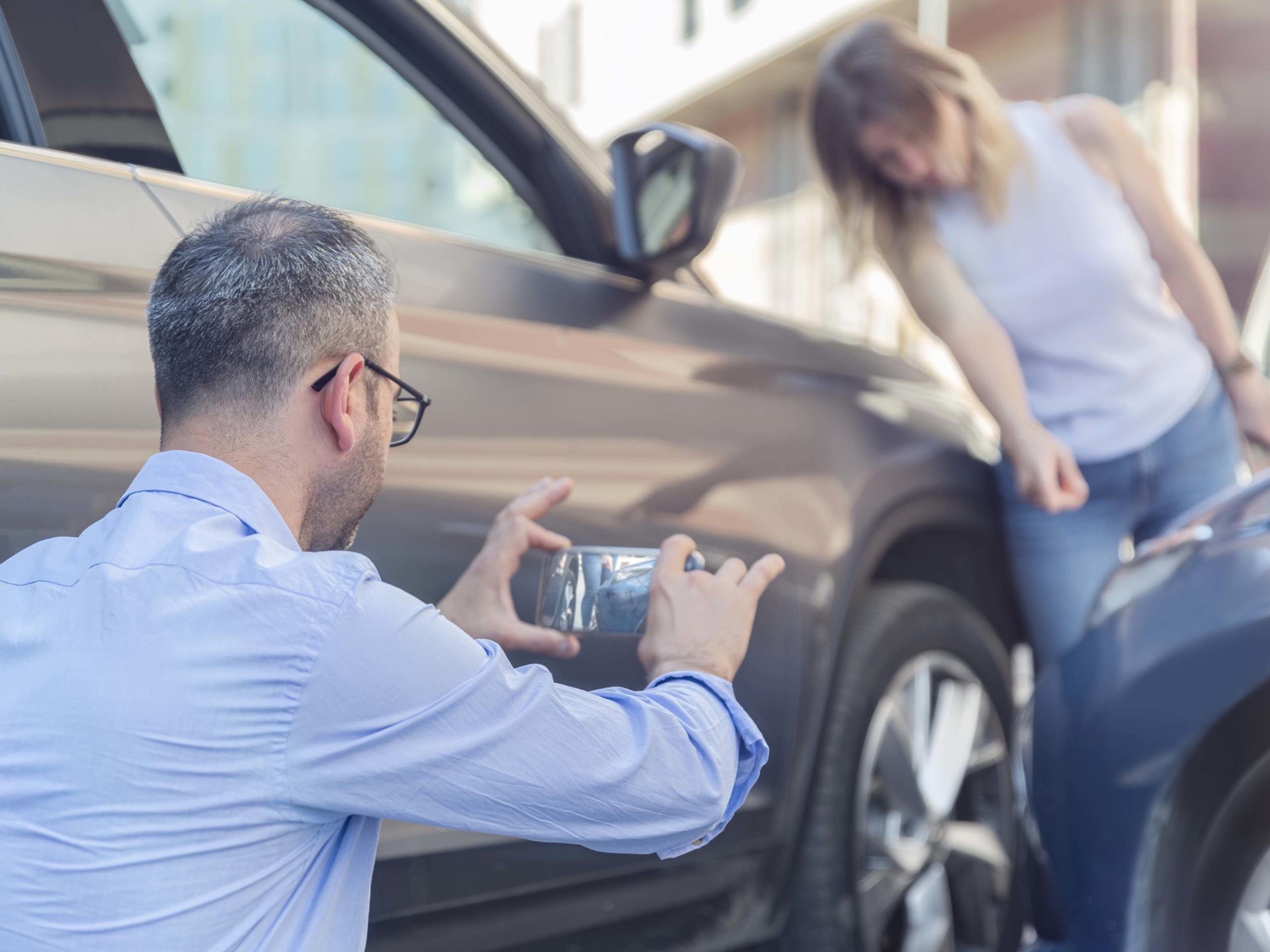 Photographing Car After A Traffic Accident