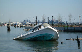 Sinking Boat in Lake