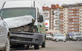 Heavily Damaged Car After Car Crash Accident On A City Street.