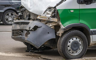 Heavily Damaged Car After Car Crash Accident On A City Street.