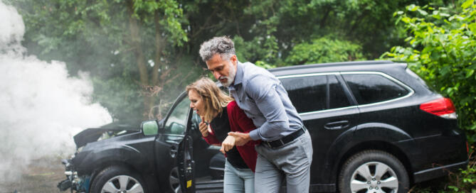 A Mature Man Helping A Young Woman To Walk After A Car Accident.