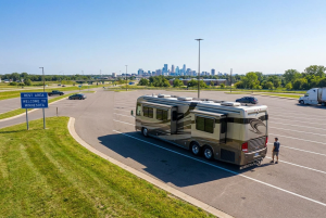 A large recreational vehicle on a highway near Minneapolis, representing legal services for motor home accidents and personal injury claims.
